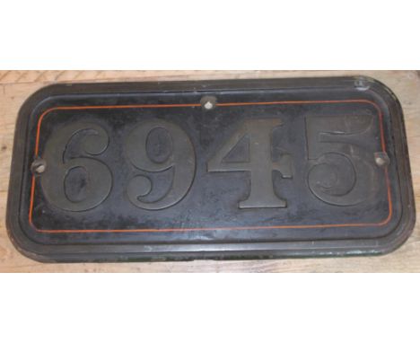 A Great Western Railway cast metal cab-side engine plate for the steam locomotive Glasfryn Hall 6945, 65cm x 30cm.6945  Glasf