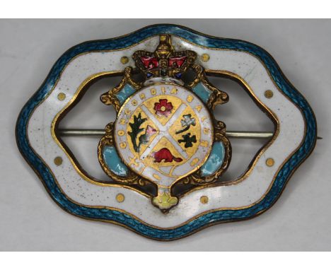 A Canadian enamel and gilt metal badge, dated 1905.  