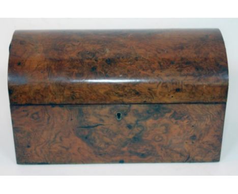 A Victorian burr walnut tea caddy of domed form, length 30cm.  