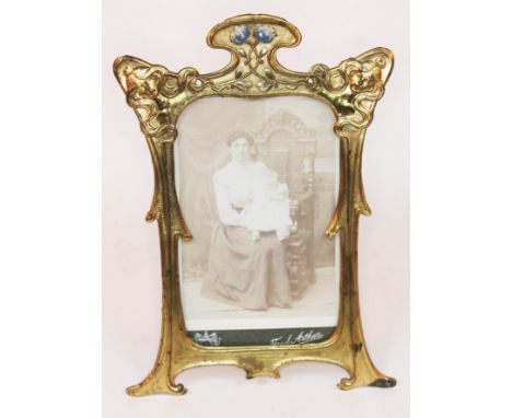 An Edwardian Art Nouveau gilt metal and enamel photo frame, height 23cm.  