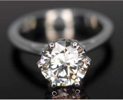 A single stone diamond solitaire ring, the six claw set modern round brilliant cut diamond weighing approx. 2.05 carats, hall