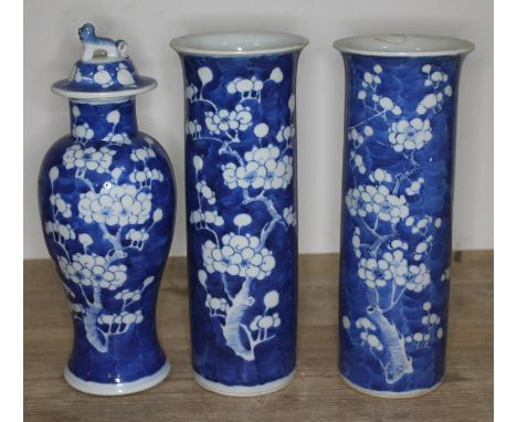 A group of three Chinese 19th century blue and white porcelain vases, each bearing Kangxi double ring mark to base, heights 2