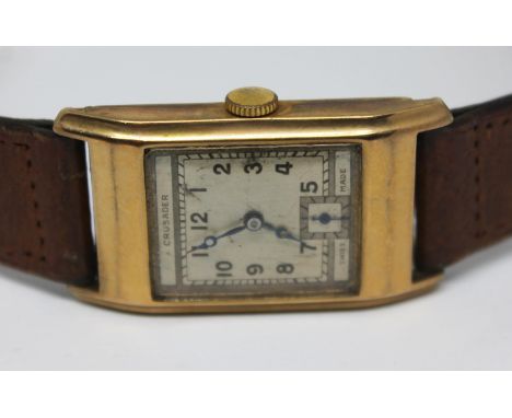 An Art Deco hallmarked 9ct gold Crusader wristwatch with 15 jewel manual wind movement and fitted with two piece brown leathe