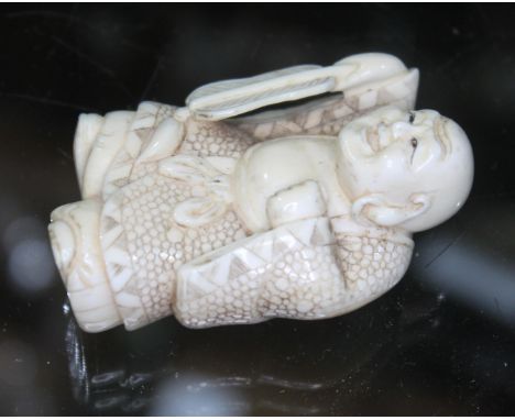 A Japanese carved ivory netsuke, Meiji period, length 5.4cm, unsigned.  