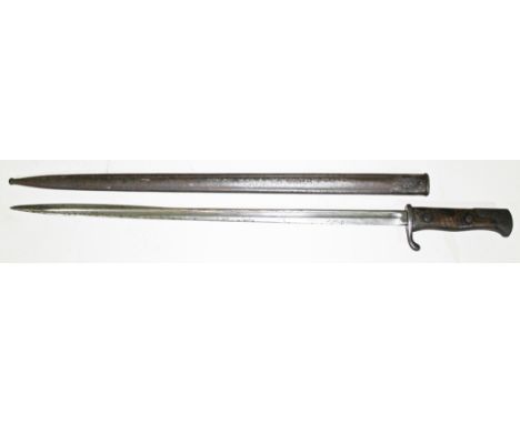 A German WWI bayonet and scabbard, length 68cm.  