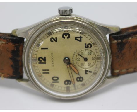 A 1940s Timor Watch Co. chrome plated military army time piece wristwatch, with silver tone signed dial, Arabic numerals, out