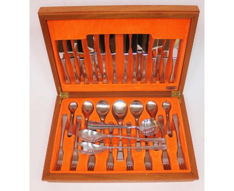 A light oak canteen of Old Hall stainless steel cutlery with two extra matching salad servers and a pair of non matching spoo