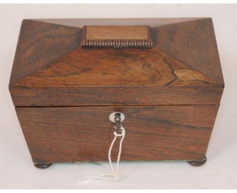 A Regency rosewood tea caddy of sarcophagus form, length 20.5cm.  