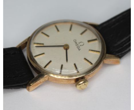 A 1970 Ladies 9ct gold Omega wristwatch 511.5137, with champagne signed dial, hands and hour markers in gold and black, origi