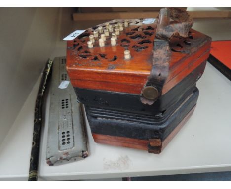 A late 19th Century Lachenal 31 button concertina , vintage harmonica and tin whistle