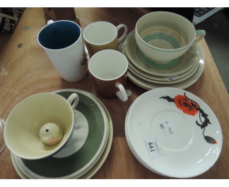 A selection of Susie Cooper design cups and saucers