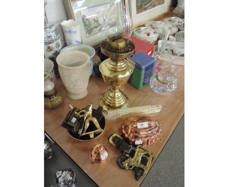A collection of decorative brass and copper including oil lamp