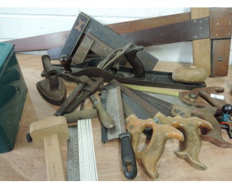 A selection of vintage carpentry tools including Tenon saws and squares etc