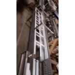 3 pc. 12 in wide Mat Chain Conveyor frame with a 90 degree curve and 35 ft overall length, all