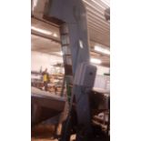 Mild Steel Cap Elevator. 84 in discharge height. Belt is 7 in wide with 2.5 in tall cleats on 6.5 in