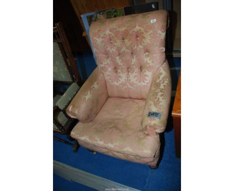Button back armchair.