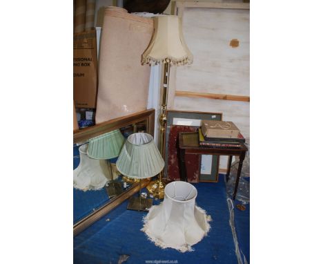 Brass standard lamp with two shades and another lamp and shade.