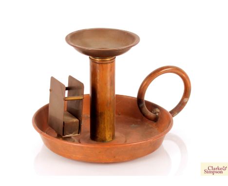 An unusual oversized brass and copper chamber stick with integral matchbox holder, 33cm dia. overall x 20.5cm high