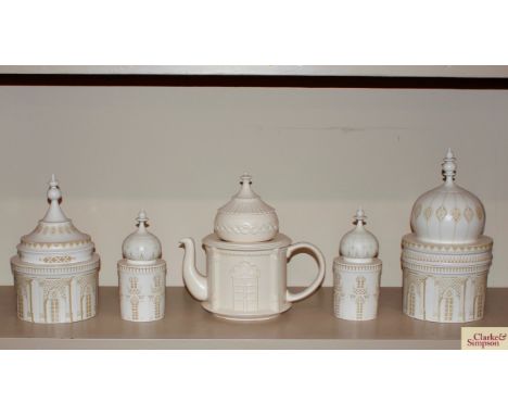 A Brighton Royal Pavilions ceramic set comprising tea pot and four lidded jars 