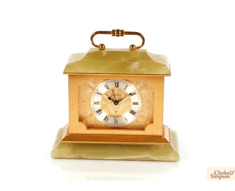 A circa 1970's onyx and brass mounted Swiza alarm clock