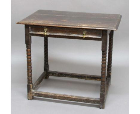 OAK AND FRUITWOOD SIDE TABLE, possibly late 17th century, the top with a single drawer on bobbin turned legs and block stretc