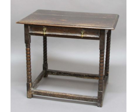 OAK AND FRUITWOOD SIDE TABLE, possibly late 17th century, the top with a single drawer on bobbin turned legs and block stretc