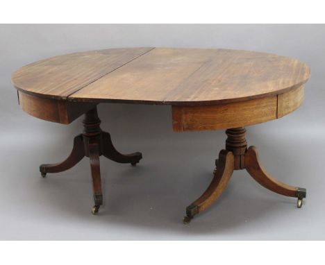 GEORGE III MAHOGANY TWIN PEDESTAL DINING TABLE, the pair of D ends on tripod bases, with two extra leaves, height 78cm, width