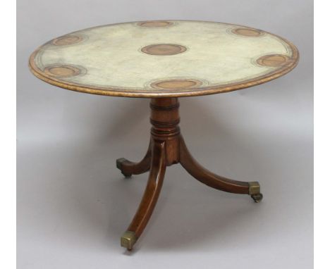 MAHOGANY AND LEATHER TOPPED GAMES TABLE, 19th century, the circular top with six wells around a central well on a turned colu