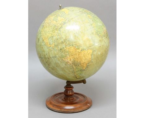 PHILIPS 19 INCH TERRESTRIAL GLOBE, on a turned walnut base, overall height 67cm