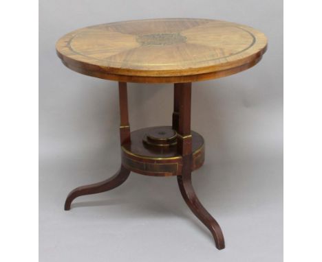 FRENCH WALNUT AND BRASS INLAID CIRCULAR TABLE, in the manner of Boule, the quarter veneered top with a central circular, bras