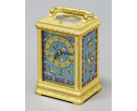 FRENCH GILT METAL AND CHAMPLEVE MOUNTED CARRIAGE CLOCK, the gilt chapter ring with floral centre and spandrils on a brass, ei