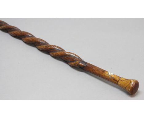 FOLK ART: Carved fruit wood walking stick, the pair of twisting serpents with black glass eyes beneath an ivory 'escutcheon' 