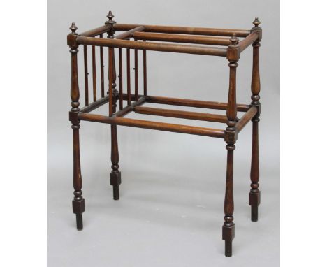 MAHOGANY STICK RACK OR AIRER, with three divisions, on slender baluster supports, height 79cm, width 61cm, depth 33cm