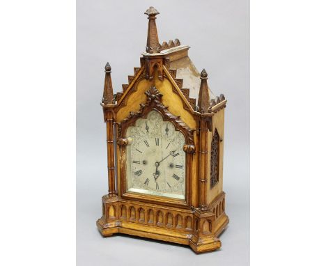 SCOTTISH GOTHIC STYLE OAK BRACKET CLOCK AND BRACKET, the 7 1/2" brass dial with subsidiary Fast Slow and Strike Silent dials 