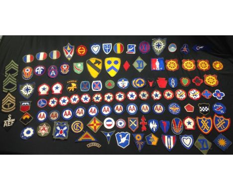 US Army Shoulder Sleeve Insignia Patches: a collection of over 100 patches plus NCO's stripes, USAAF trade badges, etc. 