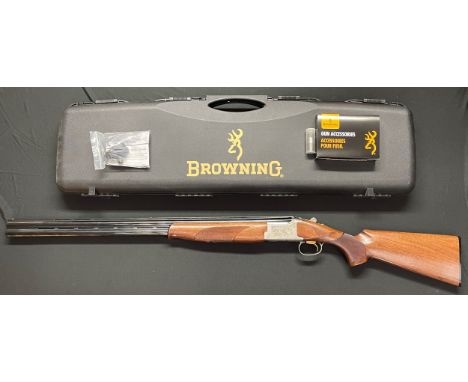 Browning Model 525 12 Bore Over and Under Shotgun with 762mm long barell, serial no 63167MP. Overall length 120cm. Engraved d