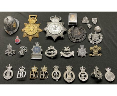 A collection of Queens Crown British Police Cap badges to include UKAEA Constabulary: Glamorgan: Somerset &amp; Bath: Cambrid