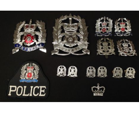 Hampshire Police insignia collection to include: Queens Crown enamelled helmet plate: Queen Crown plain metal helmet plate: p