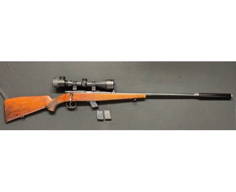 Anschutz Model 1420 .22 Long Rifle Cal Bolt action rifle serial no 325664. Fitted with a Moderator. Length of barrel inc mode