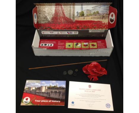 A Royal British Legion Centenary ceramic poppy by Paul Cummins made for the art installation at the Tower of London, boxed wi