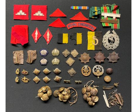 WW2 British cap badges and insignia to include three Hampshire Regiment Officers cap badges, York &amp; Lancaster Regt cap ba