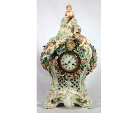 19th Century Continental gilt floral encrusted porcelain mantel clock, printed anchor mark, 49cm.