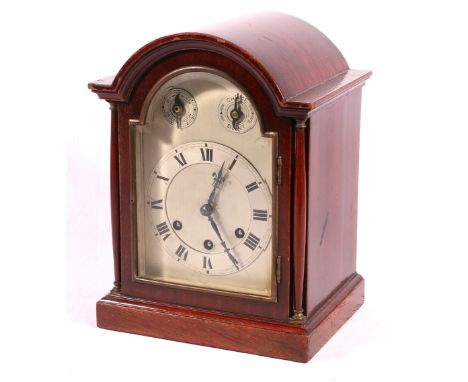 Early 20th century German mahogany mantel clock, maker Gustav Becker with arched case, silvered Roman dial and three train mo