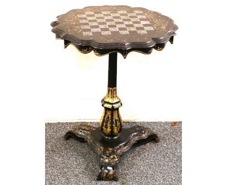 Victorian Jennens and Bettridge gilt papier mache games table, the serpentine circular tilt top with mother of pearl inlay on