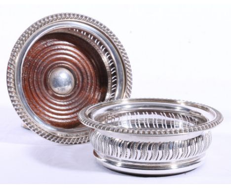 Pair of silver decanter stands with pierced and embossed bowed sides, Birmingham 1969 CONDITION REPORT: 14.5cm diameter.  Mar