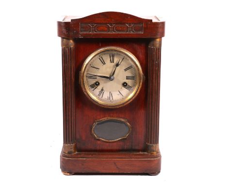 German Wurttemberg mahogany mantel clock, the silverered Roman dial in architectural case with fluted demi columns and glass 