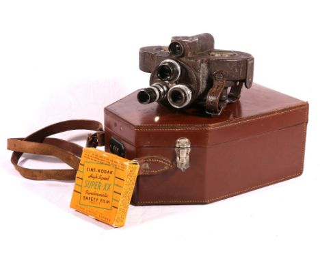 Bell and Howell 'Filmo' cine camera in leather case, c 1948.