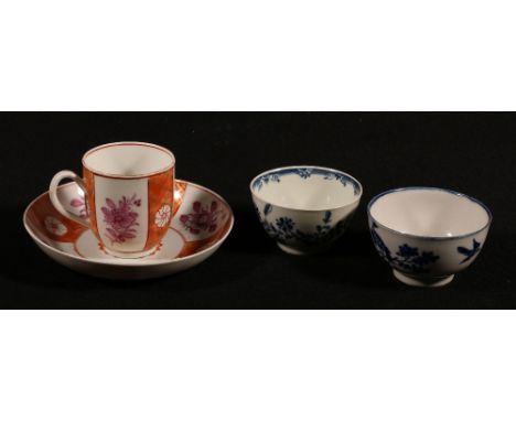 Two 18th century English blue and white tea bowls decorated with birds and flowers, possibly Liverpool and Worcester and anot