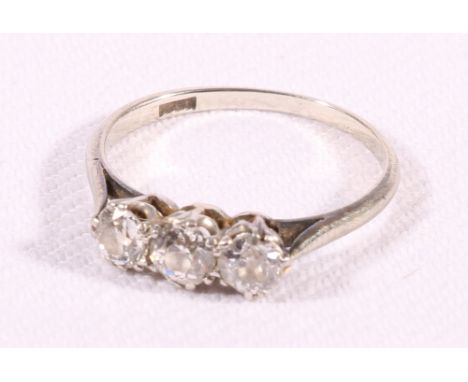 White gold diamond three stone ring in claw setting, hallmarked. CONDITION REPORT: Hallmarks not very clear
Ring size K