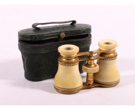 Pair of Victorian ivory opera glasses with case, CONDITION REPORT: Damages
Ivory sp;it tp left
Gilding worn
Lots of grime and